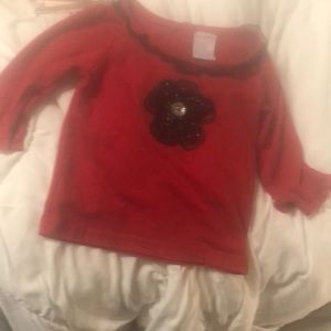 Little girls red top with black glittery trim